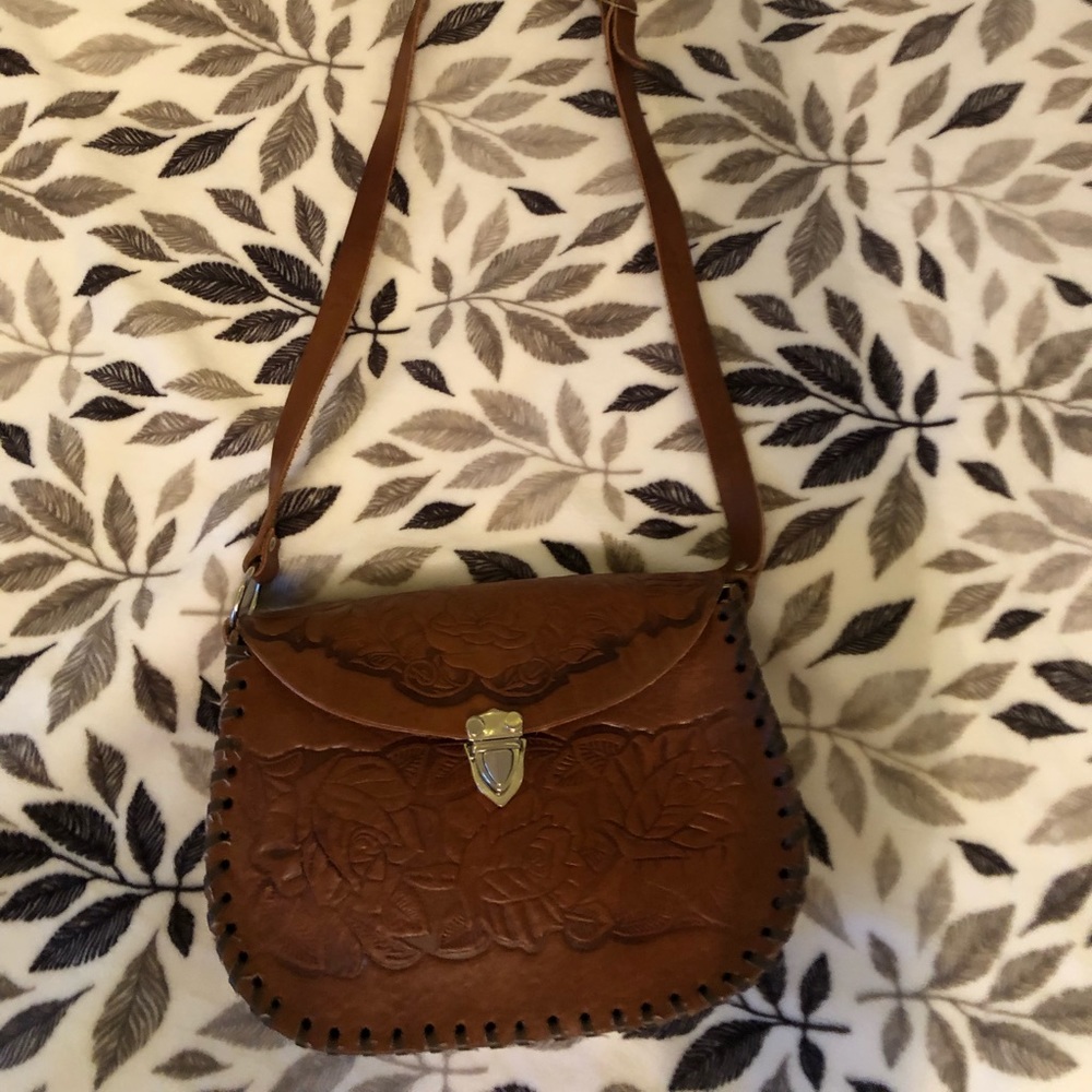 Natural leather saddle bag